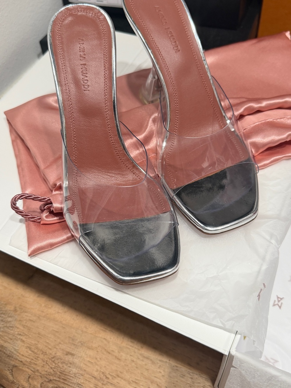 Amina Muaddi Clear Strap Slide Heels in Blush and Silver